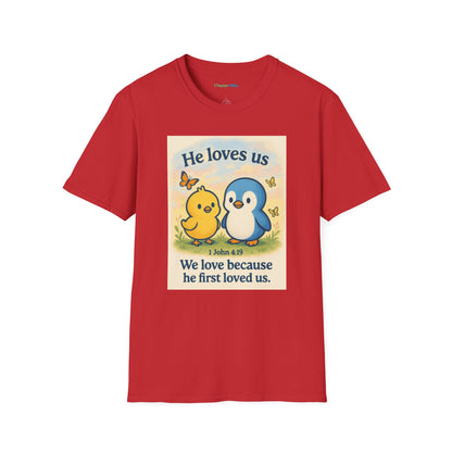 Christian T-Shirt "He Loves Us" Cute Penguin & Chick — 1 John 4:19 Faith Tee