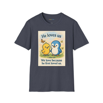 Christian T-Shirt "He Loves Us" Cute Penguin & Chick — 1 John 4:19 Faith Tee